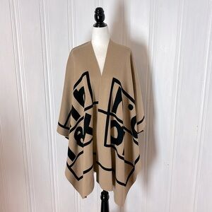 New RABE reversible tan & black poncho